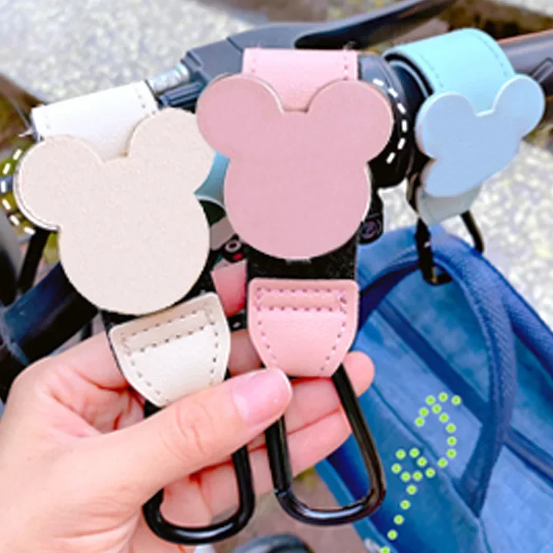 Bolsa de cuero PU para bebé con gancho para cochecito - imagen 2