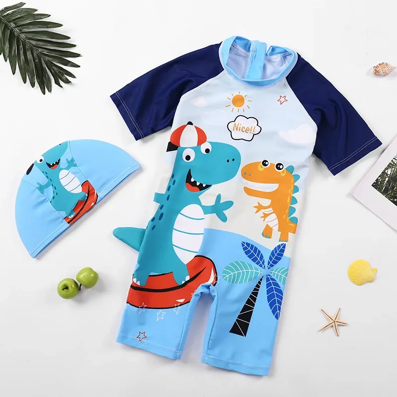 Traje de baño infantil dinosaurios con gorro y antisarpullidos