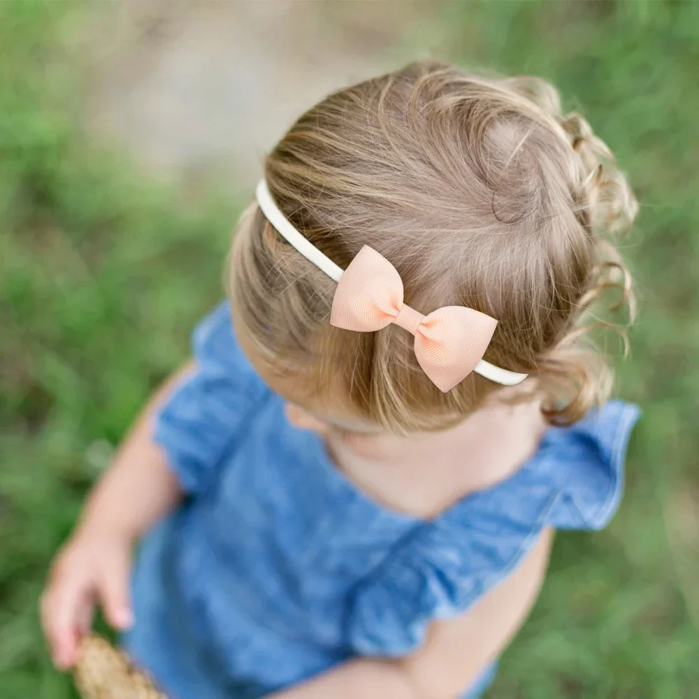 Diadema con lazo para niña – Elástica suave de colores - imagen 2