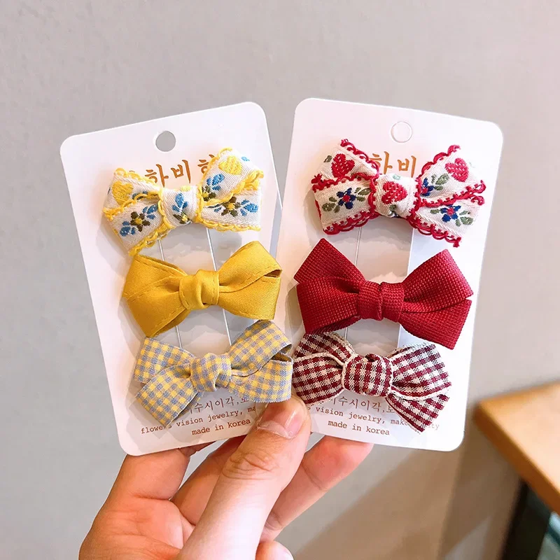 Pinzas de pelo floral con lazo para niña - Set de 3