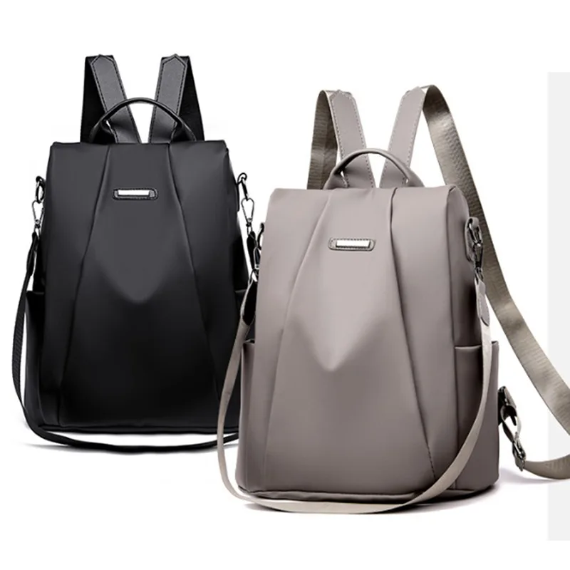 Mochila de viaje desmontable moderna de color liso con correa