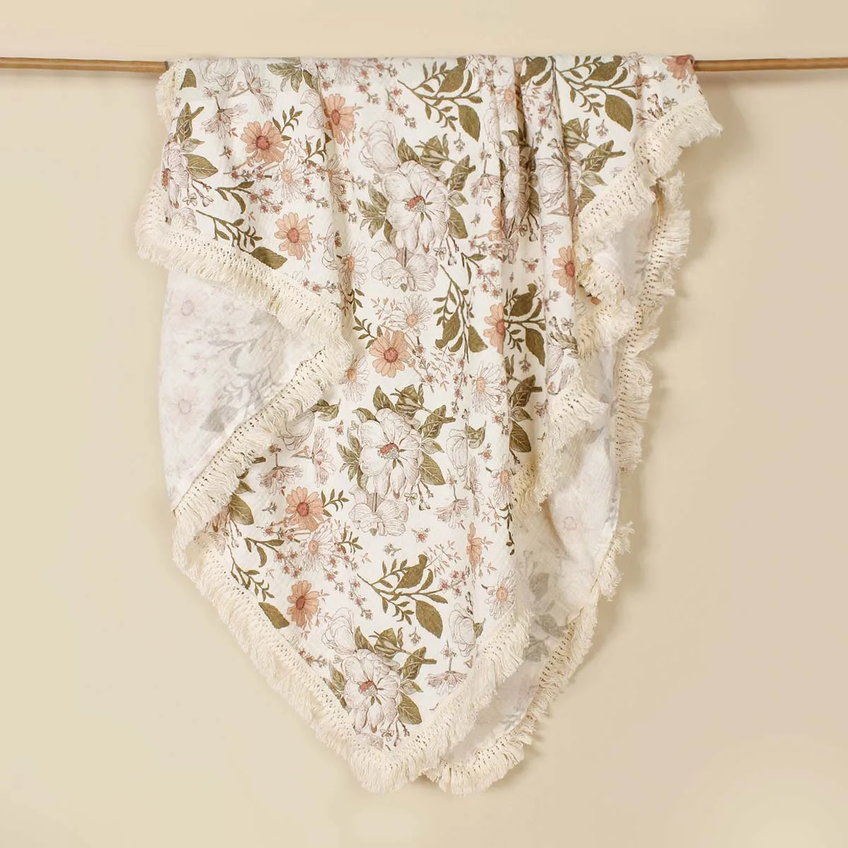 Manta arrullo de muselina floral para bebé