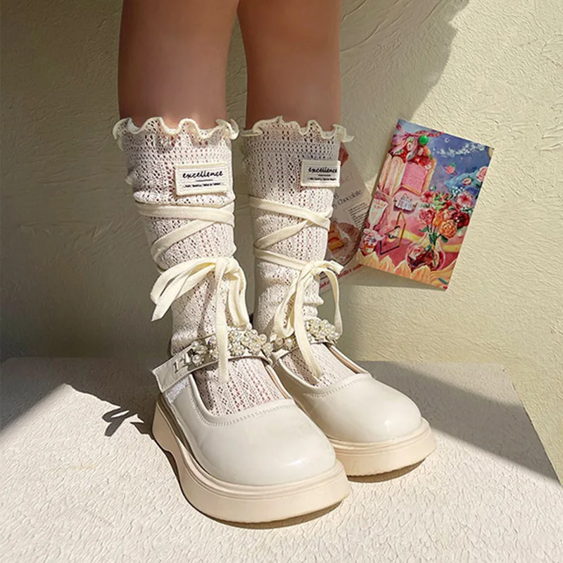 Calcetines altos de encaje blancos con lazos para verano infantil