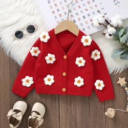 Jersey bebé de punto con botones y flores para niña