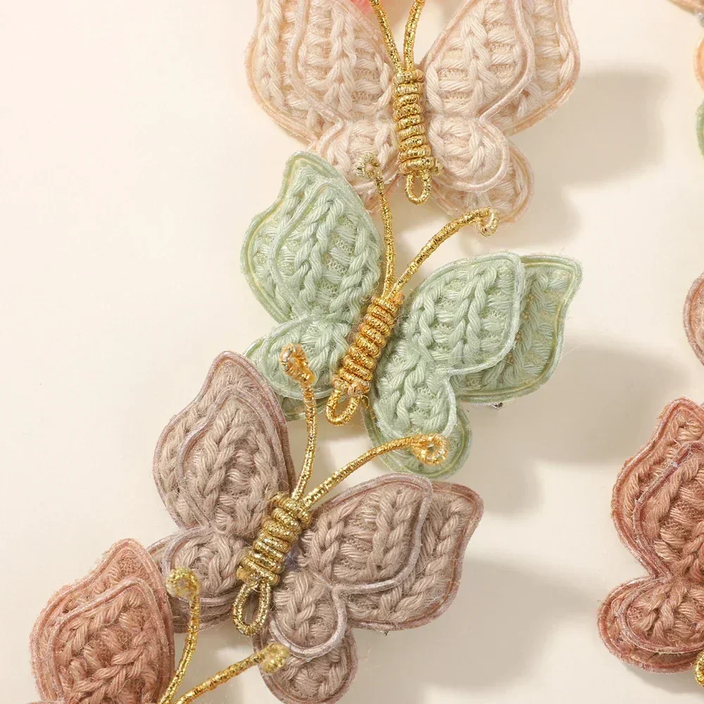 Pinzas con forma de mariposa en varios colores