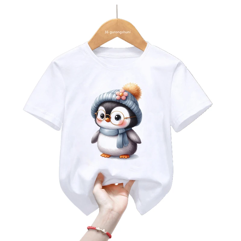 Detalle del estampado de pingüinos con globos