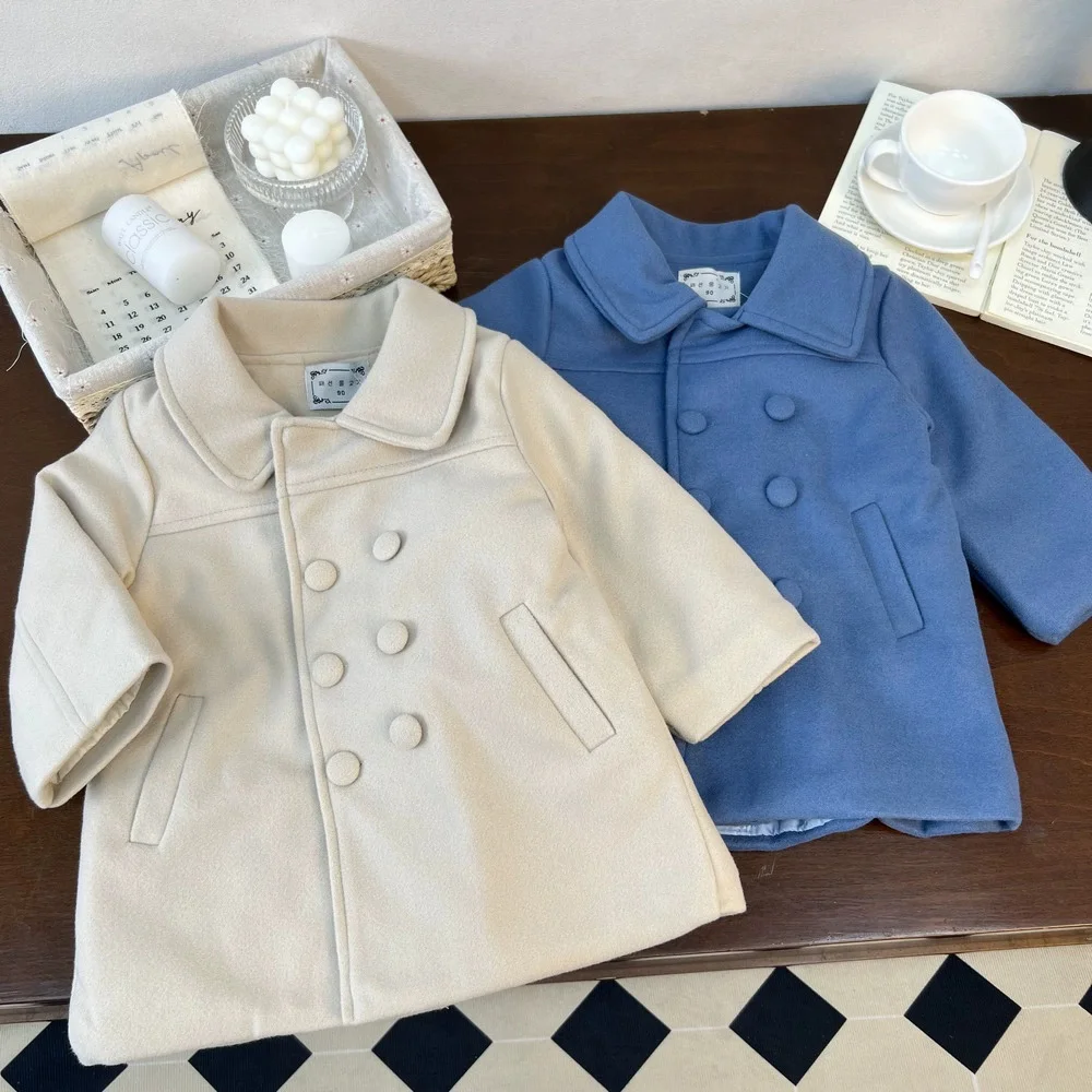 Abrigo de invierno infantil en color rosa con doble botonadura