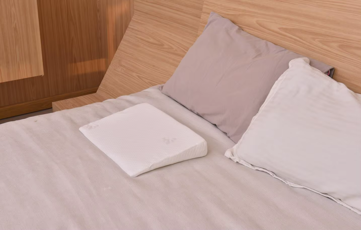 Almohada antideslizante para recién nacido