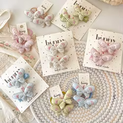 Gomas y pinzas para pelo de niña rosa con mariposa bordada primavera