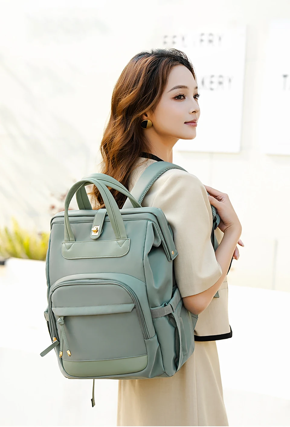 Bolsa de pañales mochila informal verde salvia claro