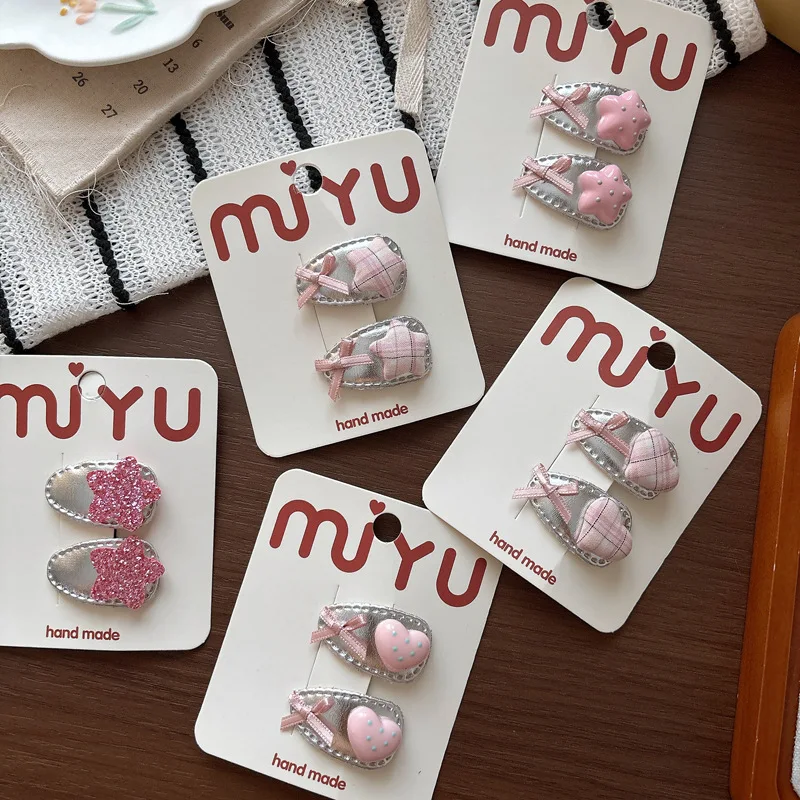 Pack con dos pinzas pequeñas para peinados infantiles