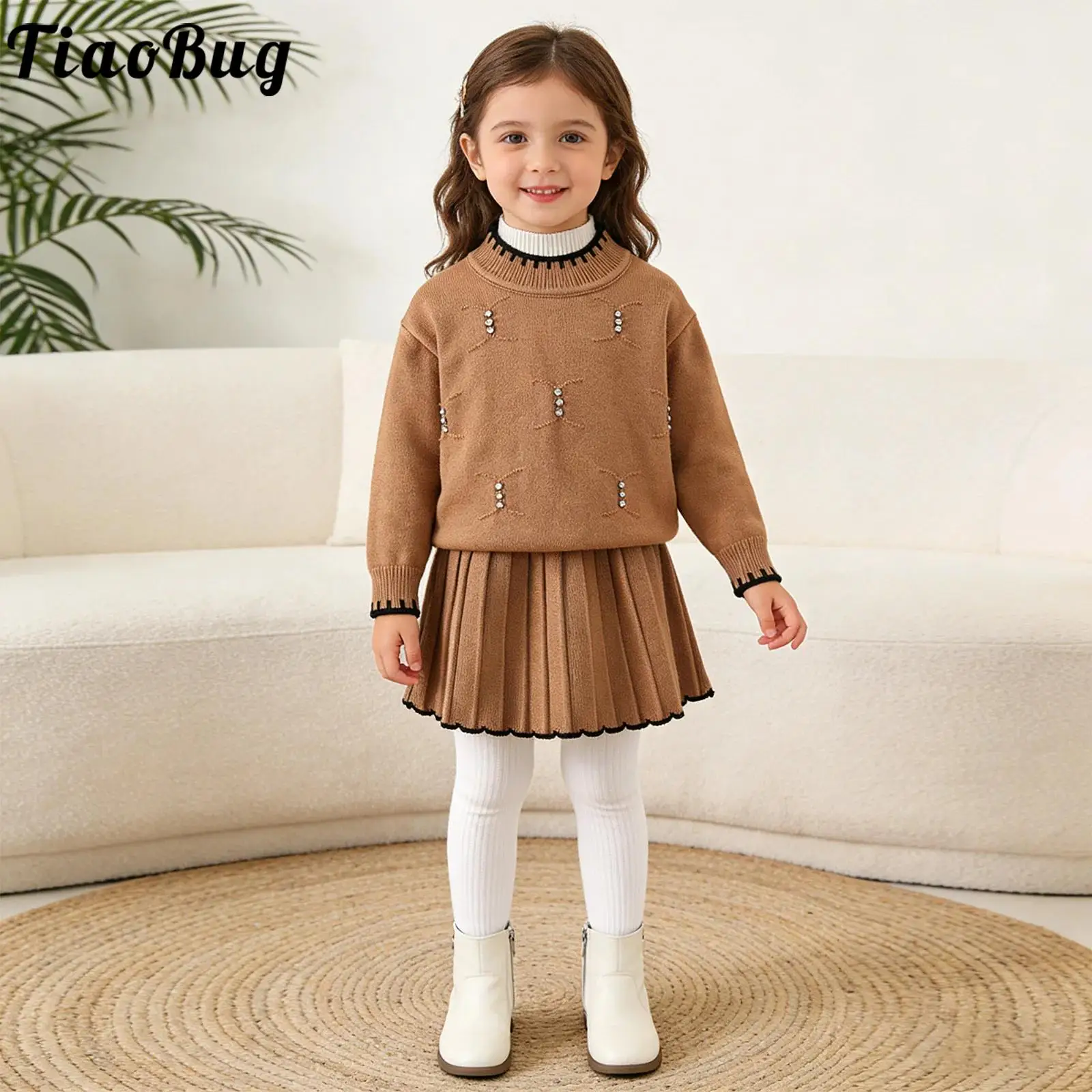 Conjunto de jersey con falda plisada y pedrería para niña