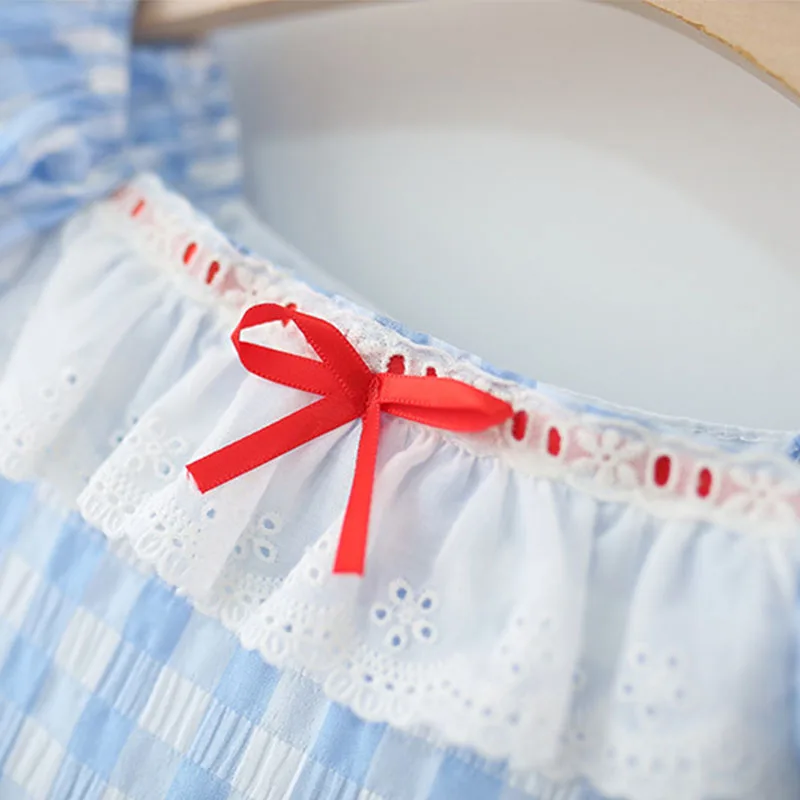 Vestido de verano para niña con lazo a cuadros azules y sombrero - imagen 5
