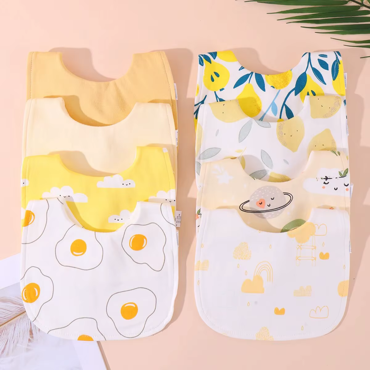 Set de tres baberos de algodón para bebé
