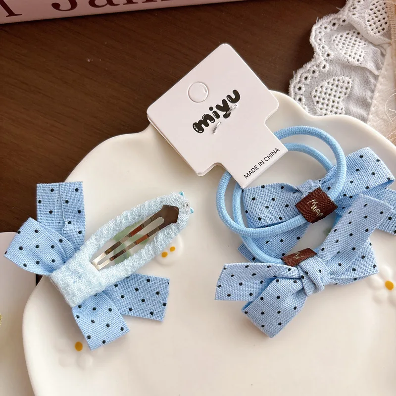 Accesorios para el cabello con lazo de lunares: pinzas y diademas - imagen 3