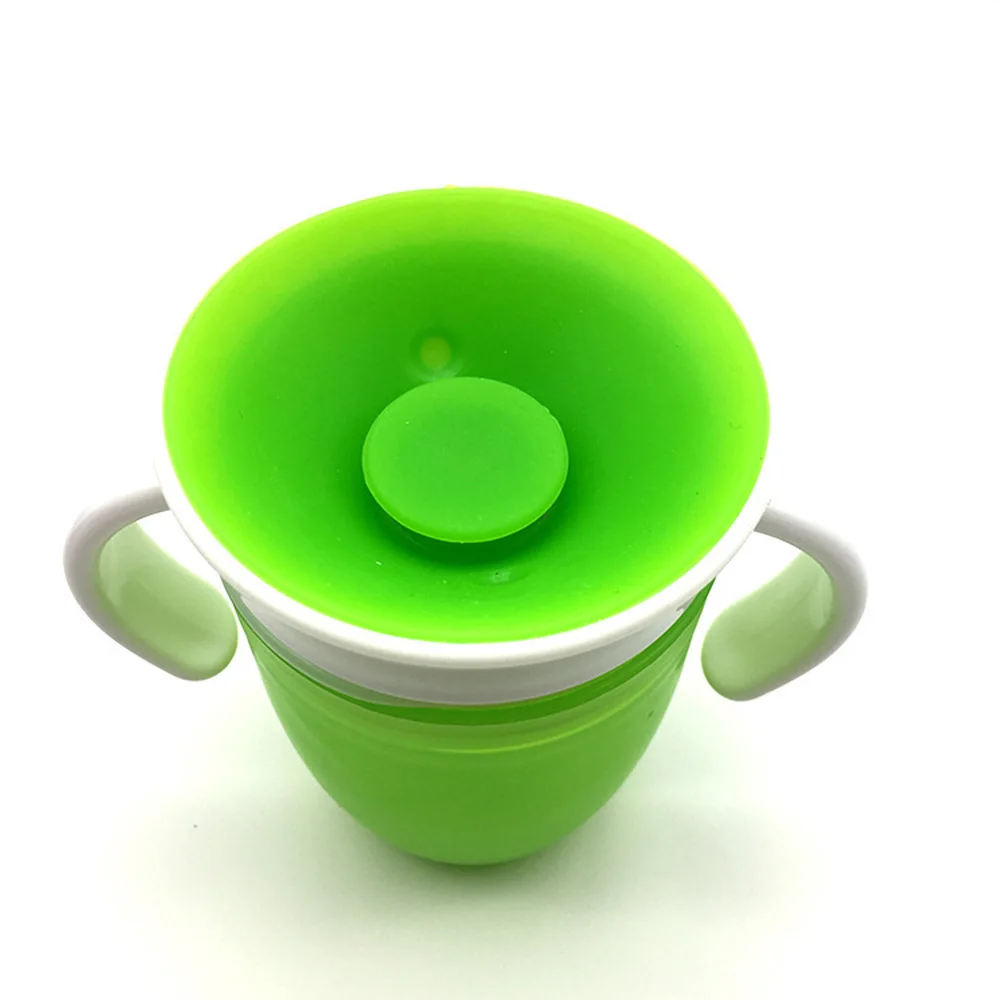 Vaso entrenador antivolcadura de silicona con asas para bebé – Aprendizaje sin messes - imagen 5