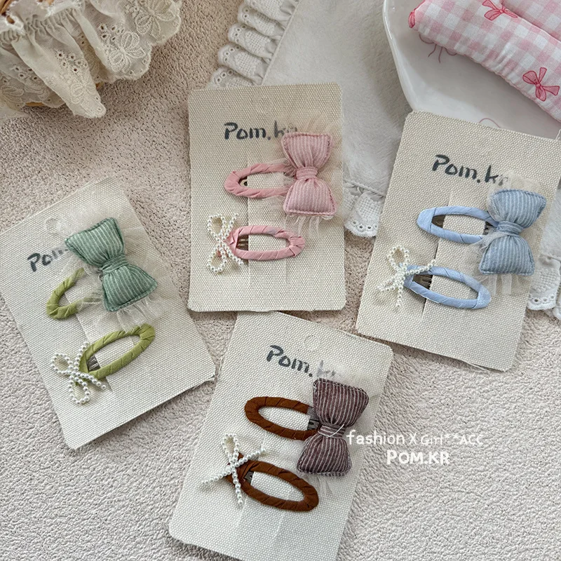 Pinzas para el pelo niña con lazo princesa y pedrería lateral - imagen 2