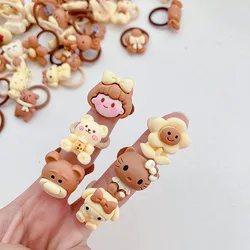 Coleteros elásticos infantiles color beige y café con dibujos animados