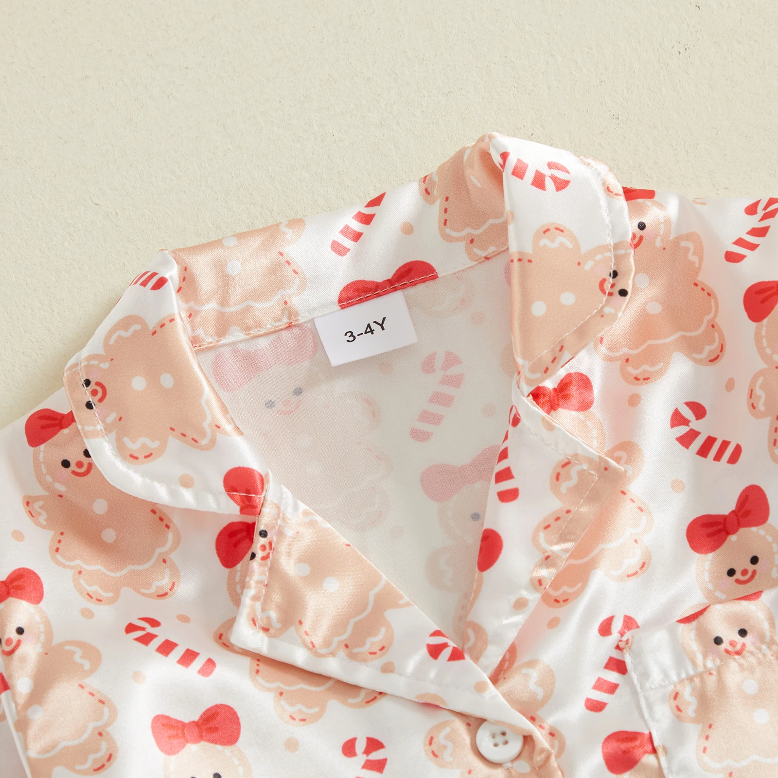 Pijama satén navideña para niña – Estampado festóngingerbread - imagen 2