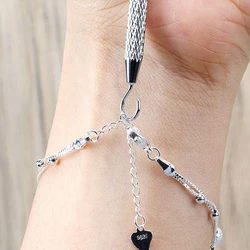 Herramienta para cierres de pulseras con clip metálico