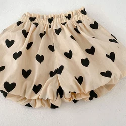 Conjunto bebé niña algodón con tirantes y corazón albaricoque
