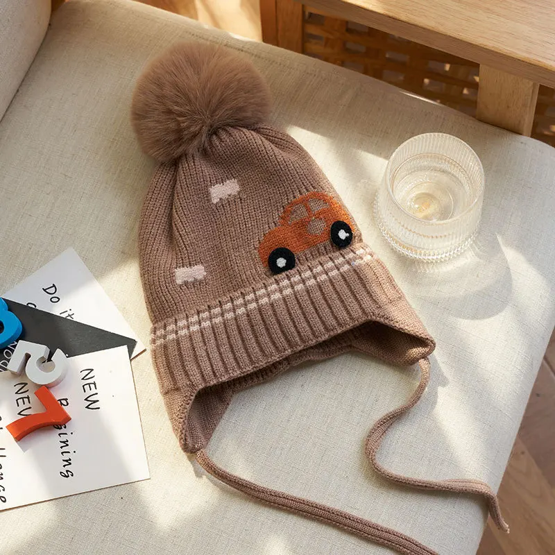 Gorro de invierno para bebé con orejeras y pompón de piel tejido