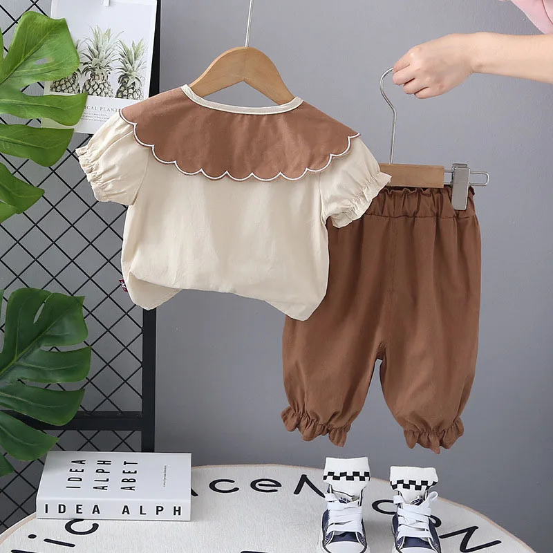 MILANCEL Conjunto verano: camisa cuello muñeca y pantalones florales - imagen 3