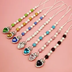 Cadena para chupete con clip de pedrería y perla cristal