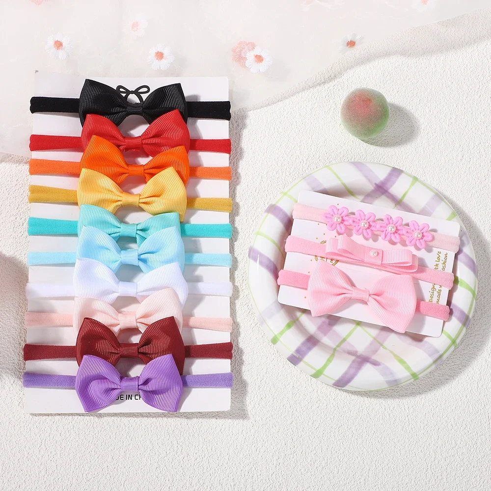 Diadema elástica para niñas con lazos y flores en tonos suaves - imagen 3