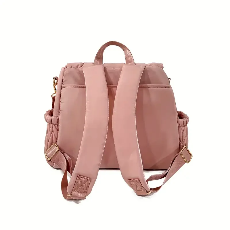 Bolsa con cambiador desplegado y bolsillo térmico visible