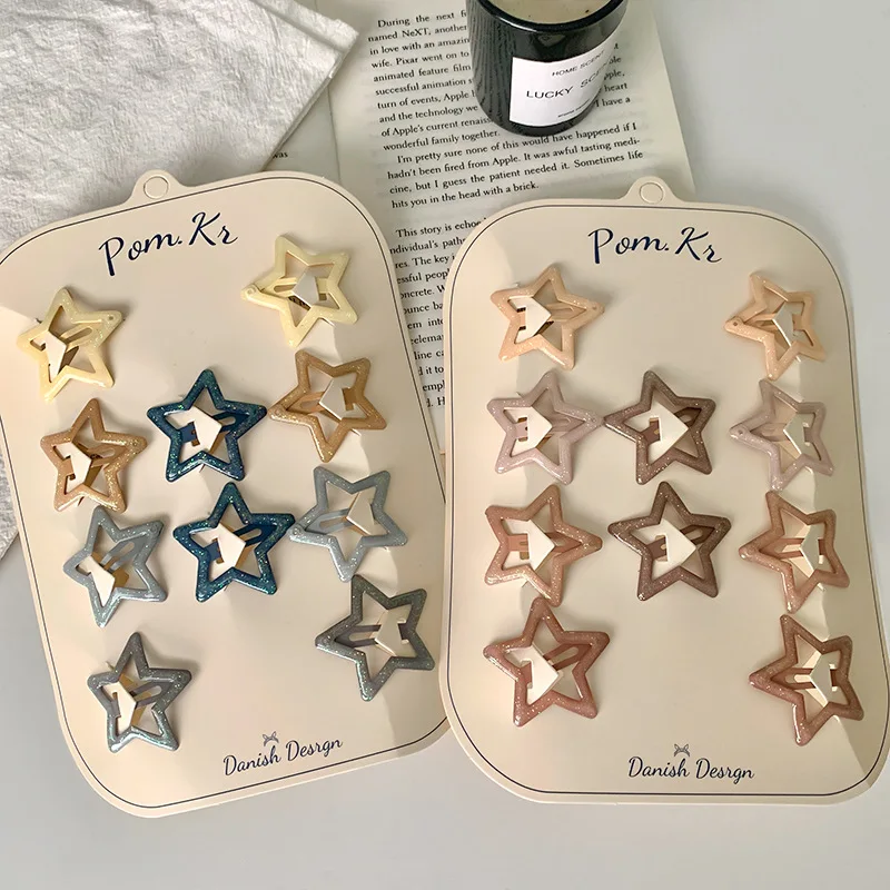 Pinzas con forma de estrella y acabado brillante