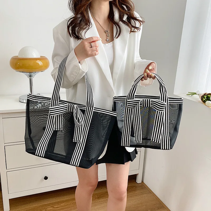 Bolso de pañales malla transparente con lazo para mamá