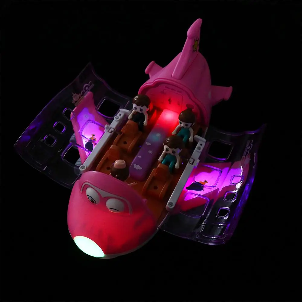 Detalle del avión de juguete con luces y color rosa