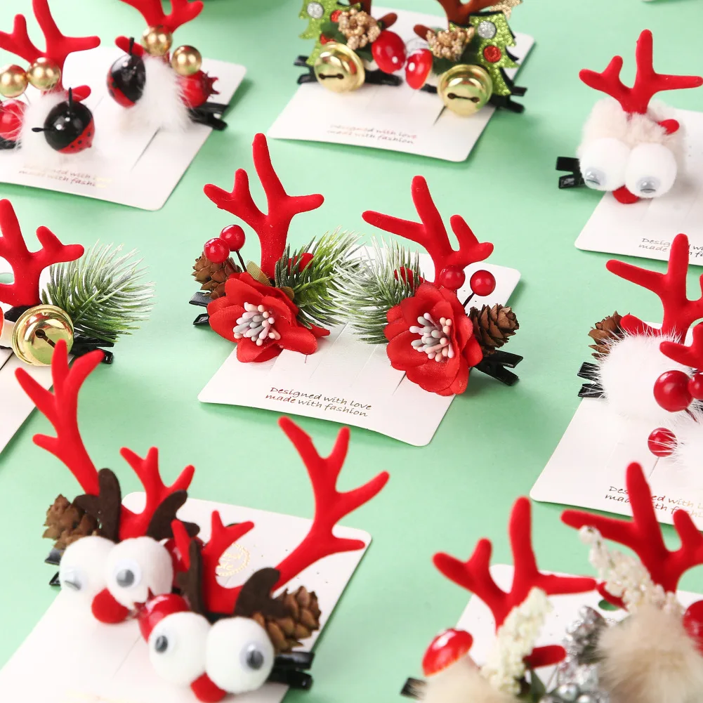 Pinzas navideñas de niñas con astas de ciervo