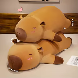 Peluche capibara acostado suave tipo almohada para decorar
