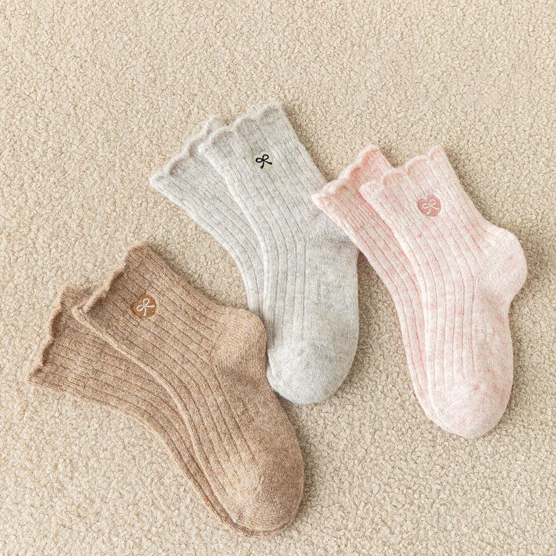 Calcetines de punto con lazo para niña – Cálidos invierno - imagen 3