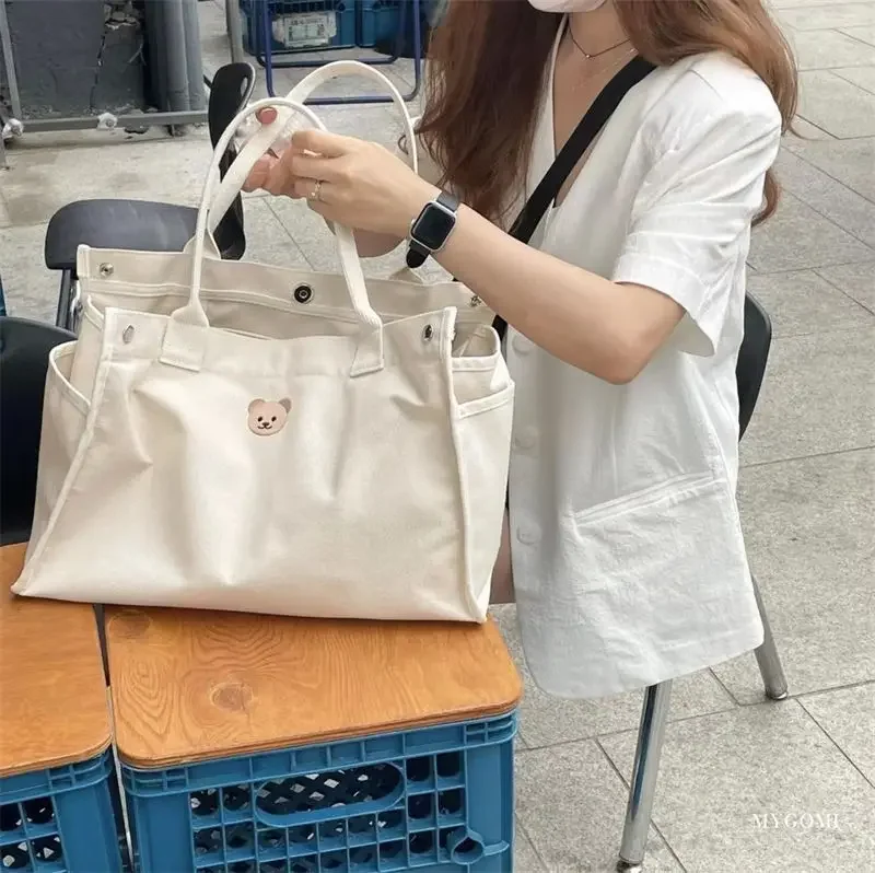 Bolsa pañalera de lona espaciosa con bolsillos para bebé - imagen 3