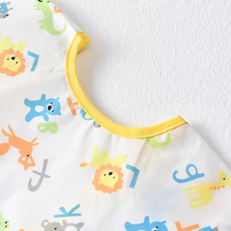 Babero impermeable manga larga para bebé con diseño de dinosaurios - imagen 4
