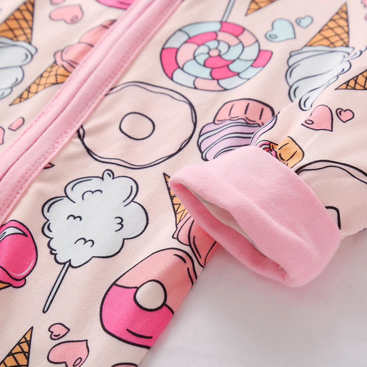 Body bebé manga larga con volantes y estampado donuts cactus