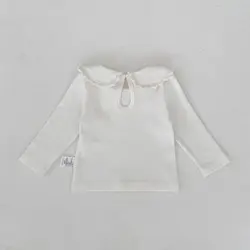 Blusa de niña blanca con cuello Peter Pan y manga larga