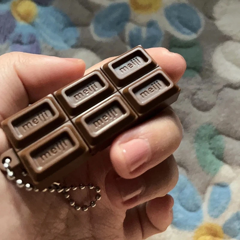 Juguete antiestrés chocolate Meiji flexible con sonido al estirar - imagen 3