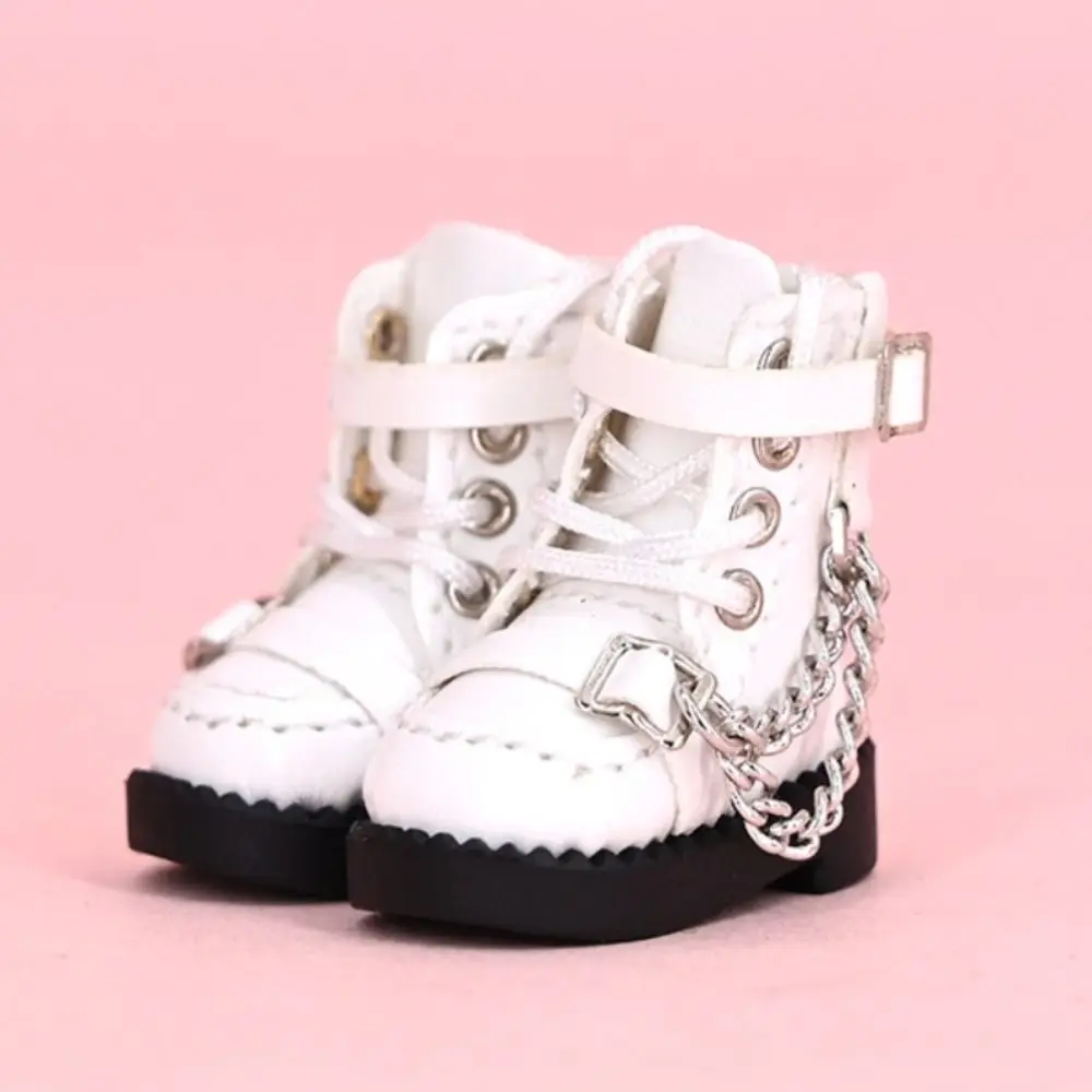 Botas de muñeca estilo caña alta con detalle metálico