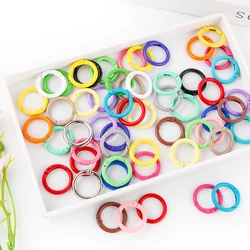 Anillos tóricos metálicos abiertos con cierre de resorte y mosquetón