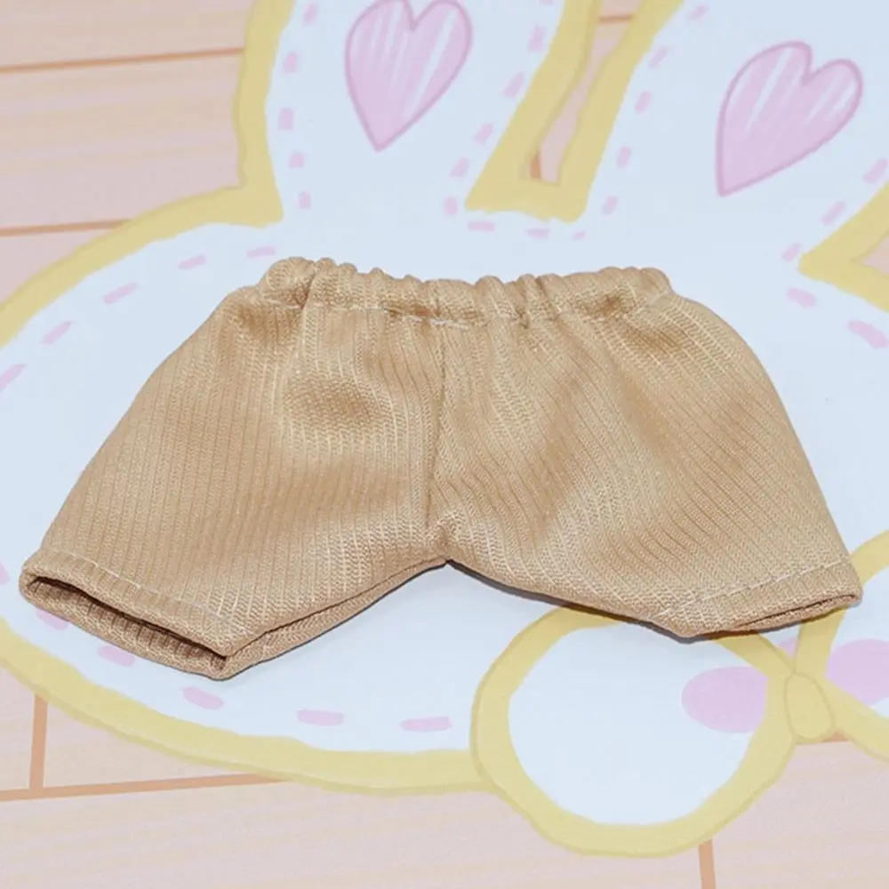 Ropa para muñecas: camiseta a rayas y pantalón vaquero corto - imagen 5