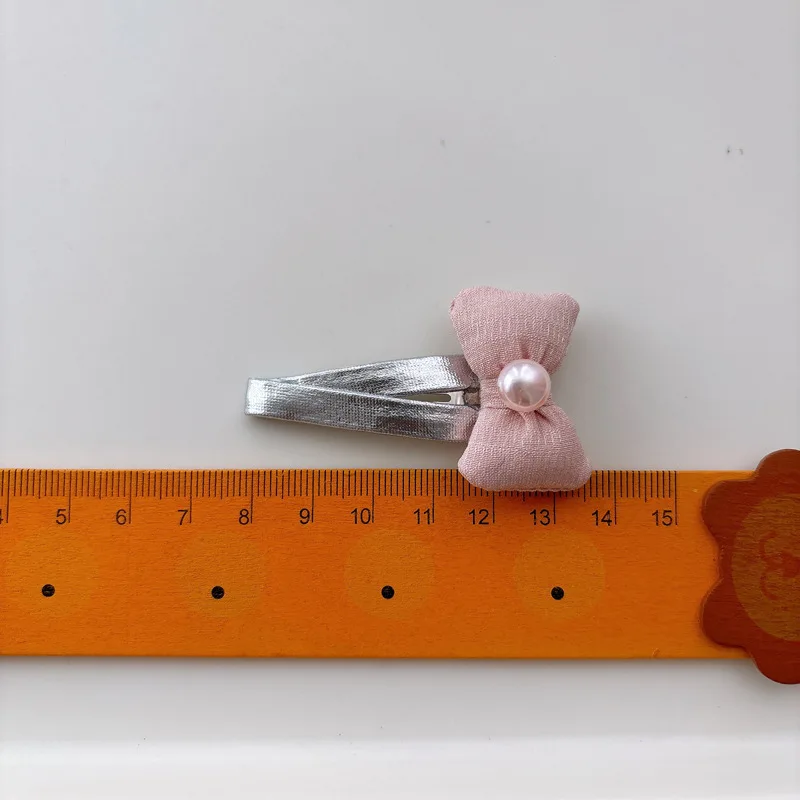 Pasador de pelo con lazo plateado y clip lateral rosa para niñas - imagen 3