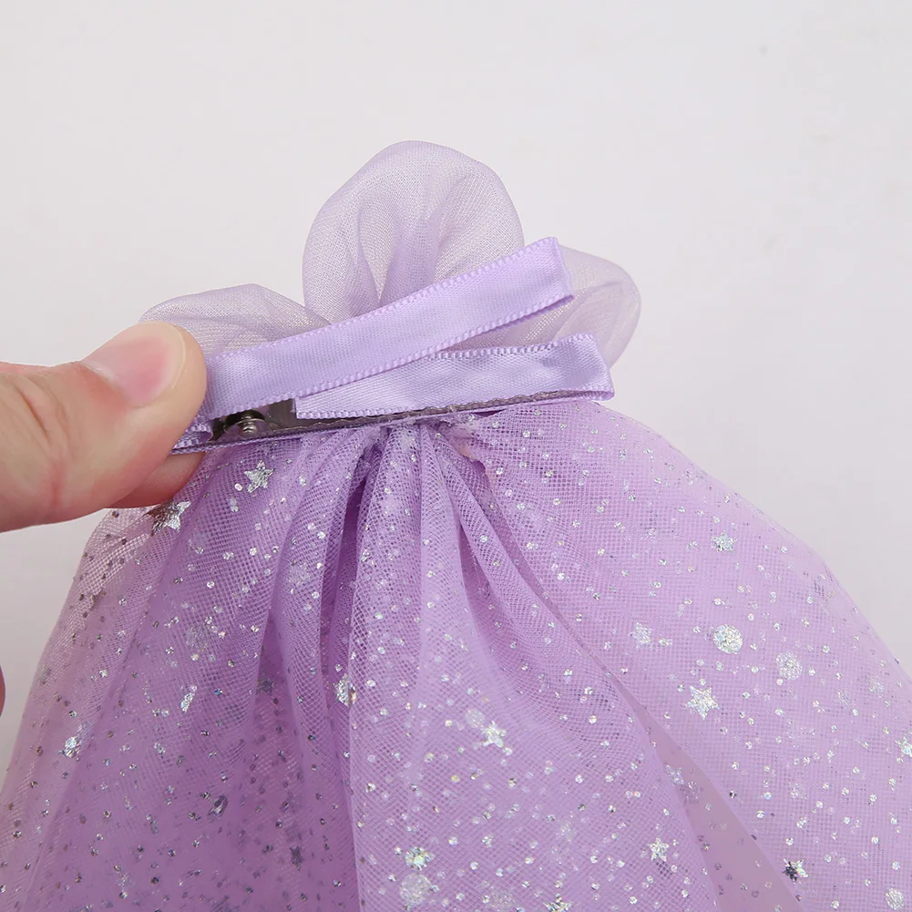 Horquilla con purpurina y diamantes de imitación