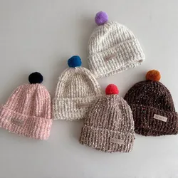 Gorro de invierno copo nieve para bebé con orejeras y pompon rizado
