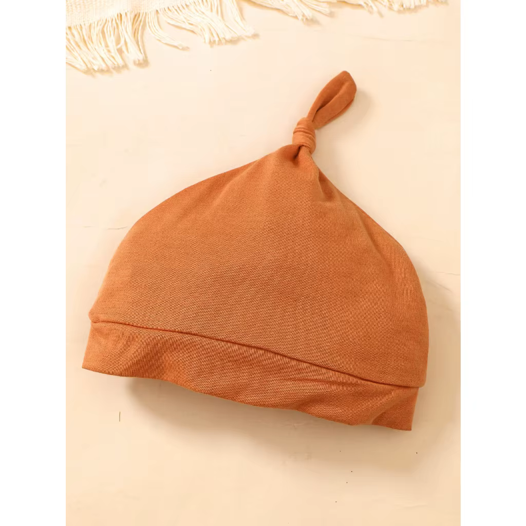 Conjunto dinosaurio para recién nacido con body, pantalón y gorro