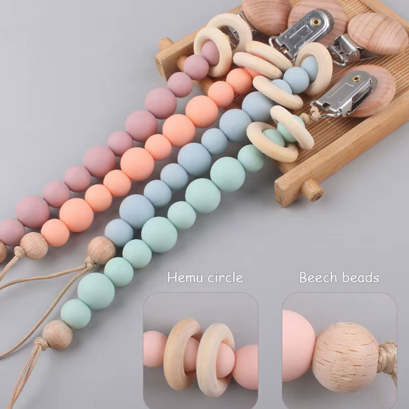 Sujetachupetes de silicona y madera natural para bebé - imagen 2