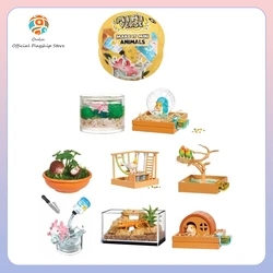 Miniuniverso caja misteriosa con figuras artesanales de animales